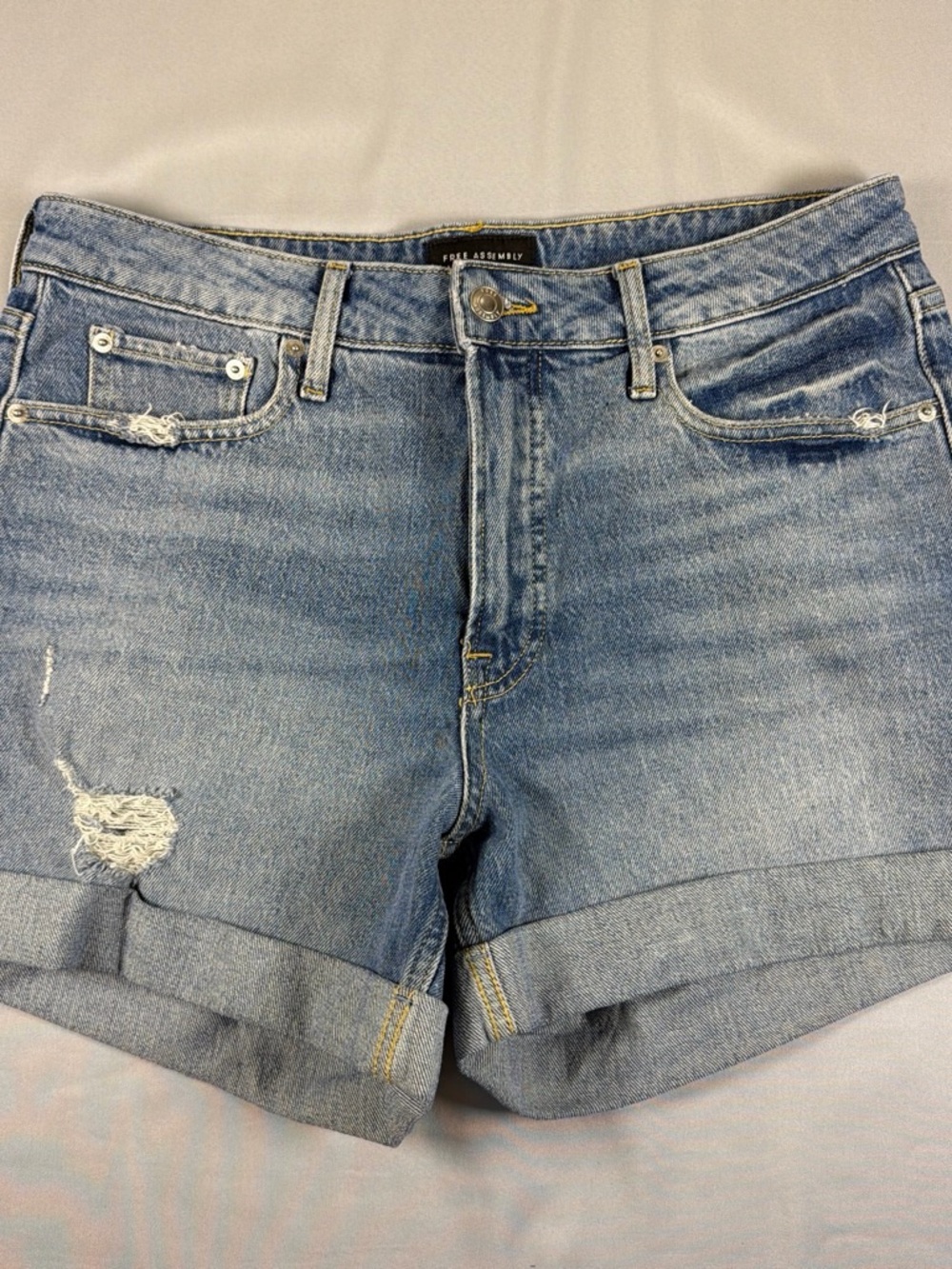 Distressed Light Blue Denim Roll-Cuff Women's Shorts